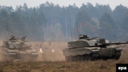 British battle tanks are seen during a NATO military exercise in Poland in October.