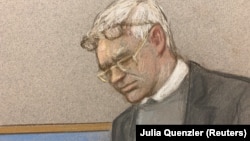 Джуліан Ассанж на слуханнях у суді в Лондоні, 24 лютого 2020 року