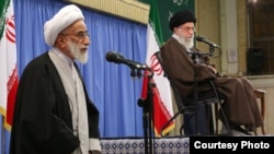 Iran -- Ahmad Jannati, secretary of Elites Council of Iran, with Ali Khamenei, IRI leader