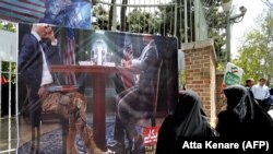 IRAN -- Iranians take part in an anti-U.S. demonstration inside the former U.S. embassy headquarters in the capital Tehran, May 16, 2018