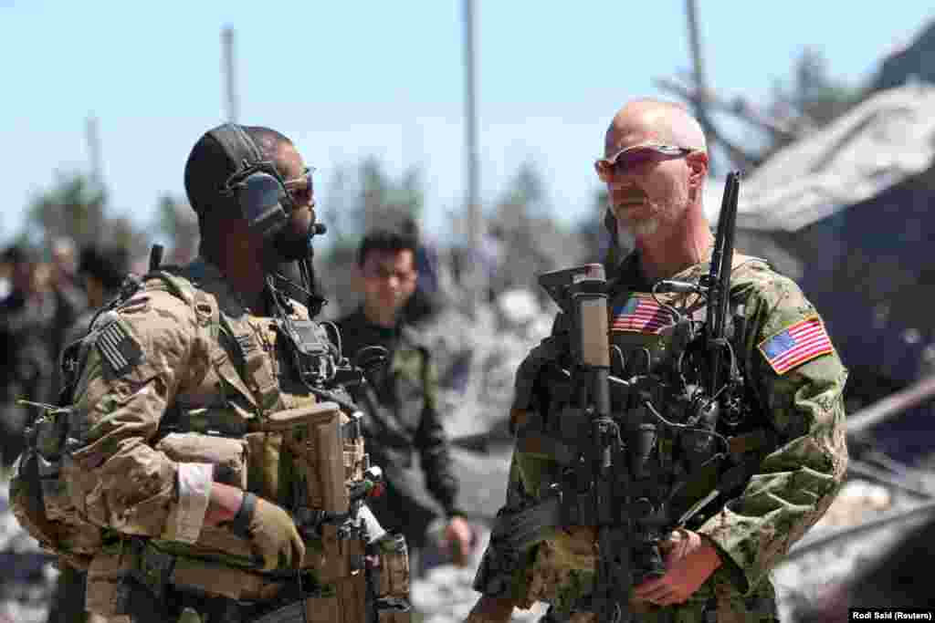 U.S. soldiers inside a YPG base in northeastern Syria in April 2017. Four American service members have been killed since the Syrian operation began, most recently in March 2018 when an American and a British soldier were killed&nbsp;by an explosive.&nbsp;