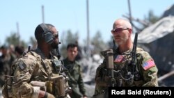 عکس، آرشیوی و مربوط به حضور نیروهای نظامی آمریکا در سوریه در سال ۲۰۱۷ است.