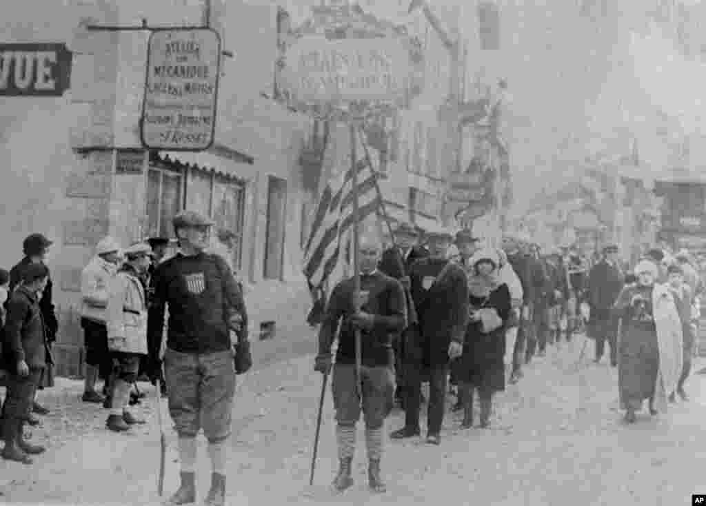 U.S. athletes carry their flag during the opening ceremonies for the first Winter Olympics in Chamonix, France, on January 25, 1924.
