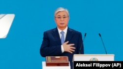 Kazakh President-elect Qasym-Zhomart Toqaev takes the oath of office during his inauguration ceremony in Nur-Sultan on June 12, 2019.
