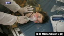 A child receives treatment at a field hospital after an alleged chemical-weapons attack in Idlib on April 4.