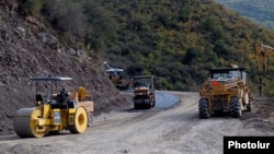 Armenia -- Workers refurbish a road in Syunik region.