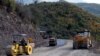 Armenia -- Workers refurbish a road in Syunik region.