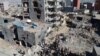 People walk among the ruins of damaged buildings following heavy fighting between government troops and Kurdish fighters in the Turkish town of Cizre near the Iraq-Syria border earlier this year. Although many blame the Sykes-Picot Agreement for much of the volatility that plagues the Middle East, there are others who suggest that alternative scenarios might have turned out much worse. 