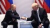 Vladimir Putin i Donald Trump na početku bilateralnog sastanka