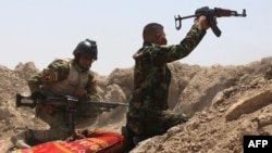 Իրաքցի զինվորականները Անբար նահանգի Գարմա շրջանում մարտեր են մղում «Իսլամական պետության» զինյալների դեմ, 19-ը մայիսի, 2015թ․