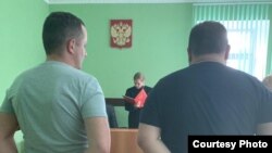 Во время чтения приговора Роману Сарычеву