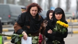 Ukrainians gathered at Boryspil International Airport outside Kyiv for a ceremony on January 19 to honor the flight's casualties as their bodies arrived home for burial.