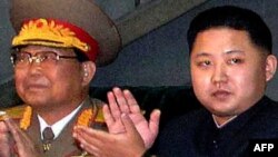 North Korean leader Kim Jong Il's son Kim Jong Un (right) emerged in 2009 as his father's likely successor.