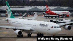 File:GERMANY -- An Airbus A340-300 of Iranian airline Mahan Air taxis at Duesseldorf airport DUS, Germany January 16, 2019