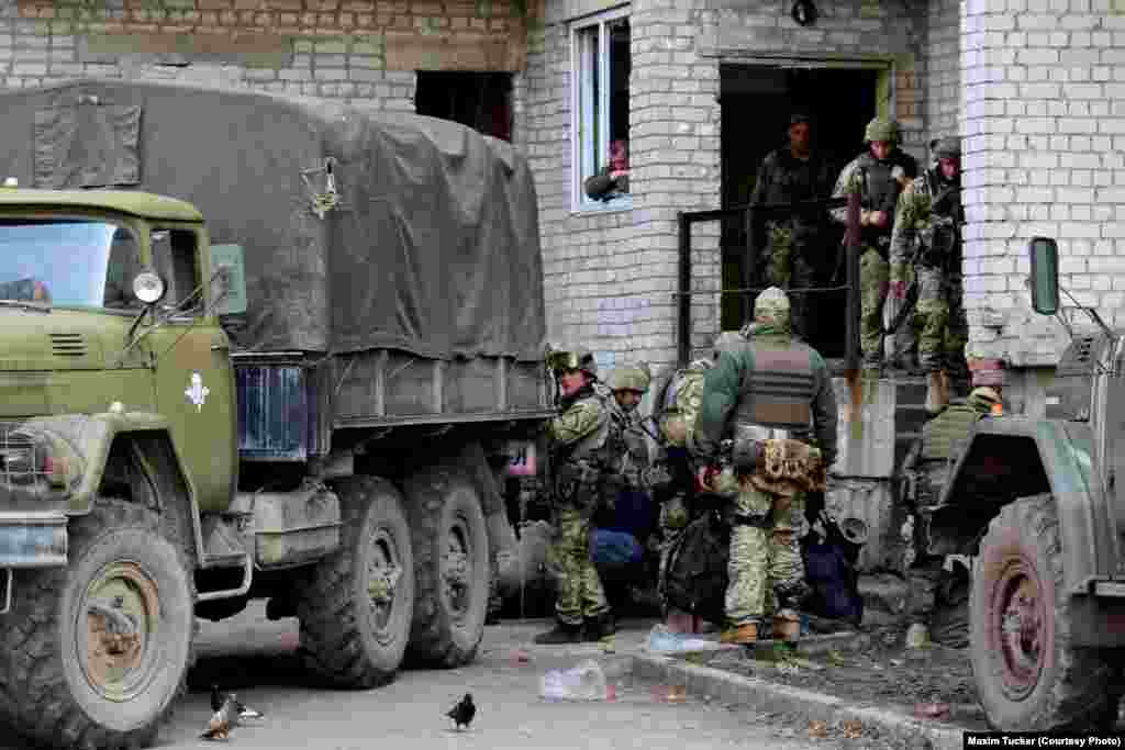 Ukrainian soldiers prepare to board an army truck heading for the front lines in Avdiyivka&rsquo;s industrial area, where the heaviest fighting is taking place. The Ukrainian Army has imposed a lockdown on the area, preventing all civilian access. April 7, 2016