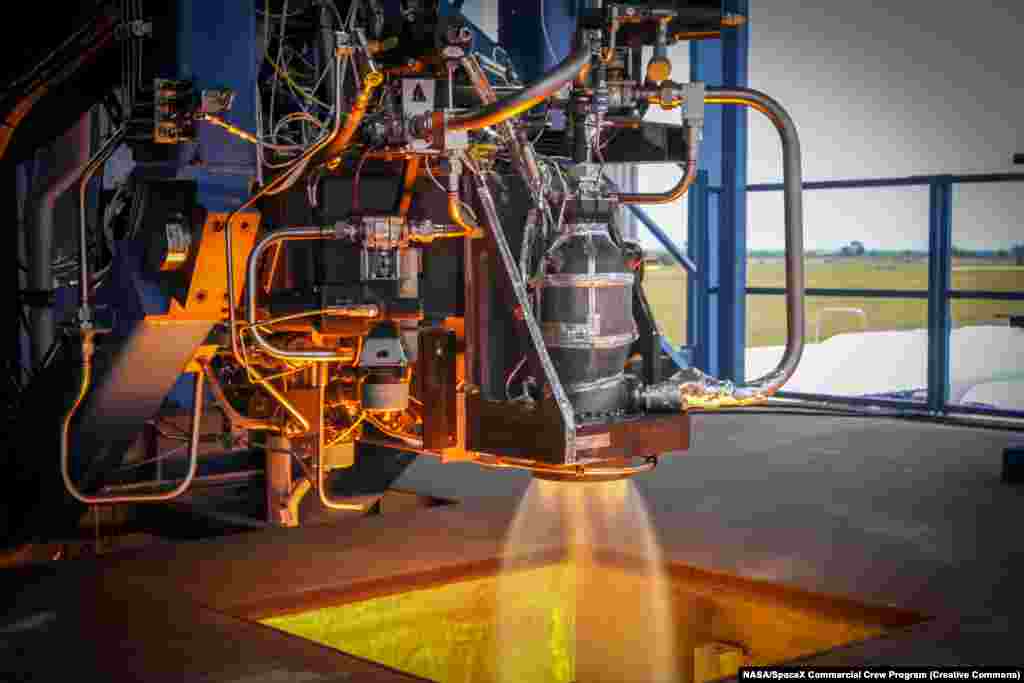 A SuperDraco being tested in 2014. The thrusters can blast the dragon to safety if the Falcon 9 malfunctions in flight or while sitting on the launchpad.