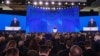 Russian President Vladimir Putin addresses the Federal Assembly at Moscow's Manezh exhibition center on March 1.