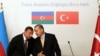 Azerbaijani President Ilham Aliyev (left) and Turkish Prime Minister Tayyip Erdogan in a June 2012 meeting at a Trans-Anatolian Natural Gas Pipeline Project signing ceremony in Istanbul.