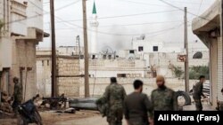 Fars News Agency photo shows Iranian revolutionary guard forces during fighting in Aleppo, Syria. undated.