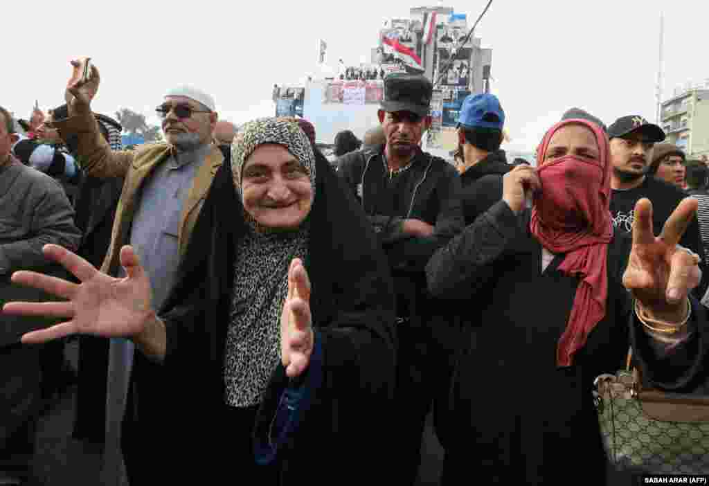 Iraqis gathered in Tahrir Square in the capital, Baghdad, amid ongoing anti-government protests on December 10. (AFP/Sabah Arar)