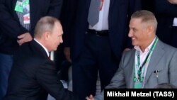 Владимир Путин и Борис Ротенберг на Гран-при России "Формулы-1" в Сочи, апрель 2017 года