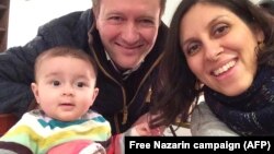 Iranian-British aid worker Nazanin Zaghari-Ratcliffe (right) with her husband, Richard Ratcliffe, and daughter Gabriella in an image released in 2016