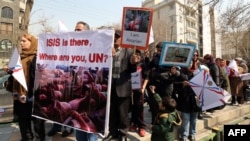 Iran -- Some 200 Iranian Assyrian Christians take part in a protest in front of the United Nations office in Tehran, March 12, 2015