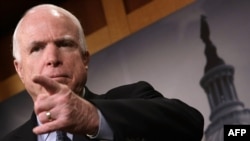 U.S. -- Sen. John McCain (R-AZ) speaks during a press conference at the Capitol in Washington, February 5, 2015
