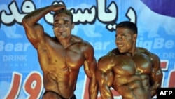 Afghan bodybuilders perform during a Mr. Afghanistan competition in Kabul in 2012.