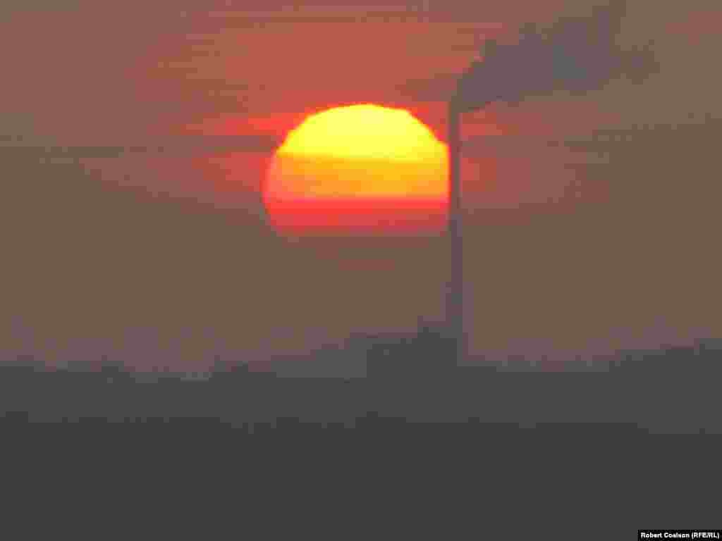 FINALIST: "Where Energy Comes From": Dawn on March 3, 2013, in Prague. A little more climate change goes into the air. (Robert Coalson, RFE/RL's Central Newsroom)