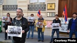 France - French-Armenian activist Schanth Vosgueritchian leads a protest outside the Armenian Embass in Paris, 28April 2015.