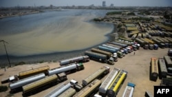 Tanker trucks used to transport fuel to NATO forces in Afghanistan are seen parked near oil terminals in the Pakistani port city of Karachi in May.