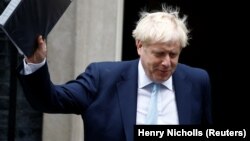 نخست‌وزیر بریتانیا هشدار داده بود اگر نمایندگان پارلمان جدول زمانی او برای خروج بریتانیا از اتحادیه اروپا را رد کنند، خواستار برگزاری انتخابات می‌شود.