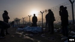 Илустрација: Мигранти во грција.