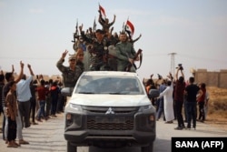 Войска Башара Асада входят в город Айн-Иса. 14 октября 2019 года