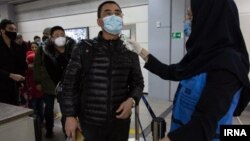 تصویری از کنترل مسافران ورودی از چین در فرودگاه تهران