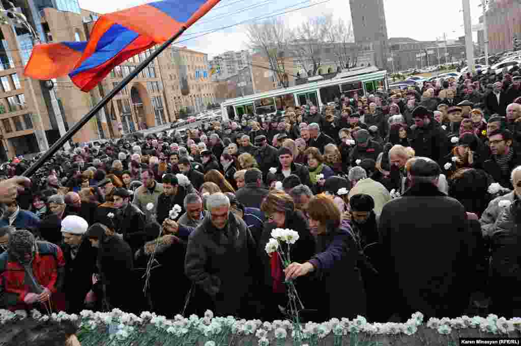 On March 1, Armenian opposition supporters pay an anniversary tribute to those who died in post-election violence five years previously. On March 1, 2008, demonstrators protesting the official presidential election results were violently dispersed by security forces, leaving 10 people dead. (RFE/RL/Karen Minasyan)