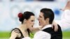 Олимпийские чемпионы в танцах на льду Тесса Вирту и Скотт Мойр (Канада)