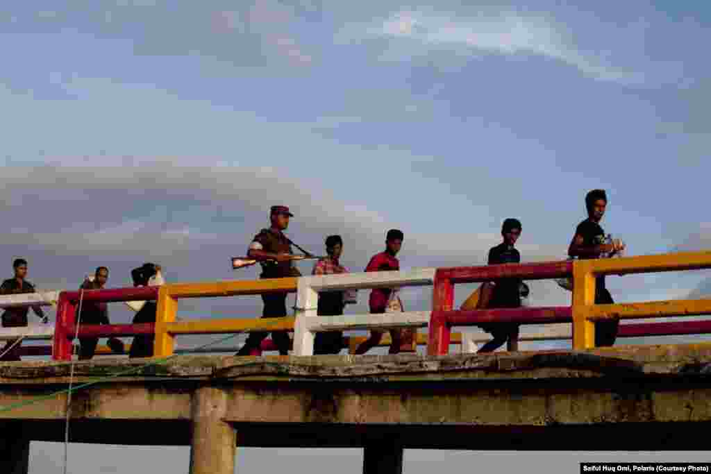 After being detained by the border guards, the refugees are fed, given water, and sent back to sea. 