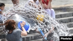 Armenia -- Residents of Yerevan celebrate the festival of Vardavar pouring water upon each other (file photo)
