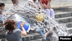 Armenia -- Residents of Yerevan celebrate the festival of Vardavar pouring water upon each other (file photo)