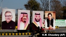 Portraits of Pakistani and Saudi leaders displayed on the occasion of the visit by Saudi Arabia's Crown Prince to Pakistan, in Islamabad, February 15, 2019