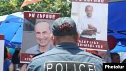 Armenia -- Supporters of former President Robert Kocharian protest outside a court in Yerevan, June 19, 2019.