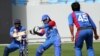 A U.S. batsman takes a swing in a qualifier against Afghanistan, won by the Afghans, in Dubai on February 11 for the Twenty20 World Cup. (photo International Cricket Council)