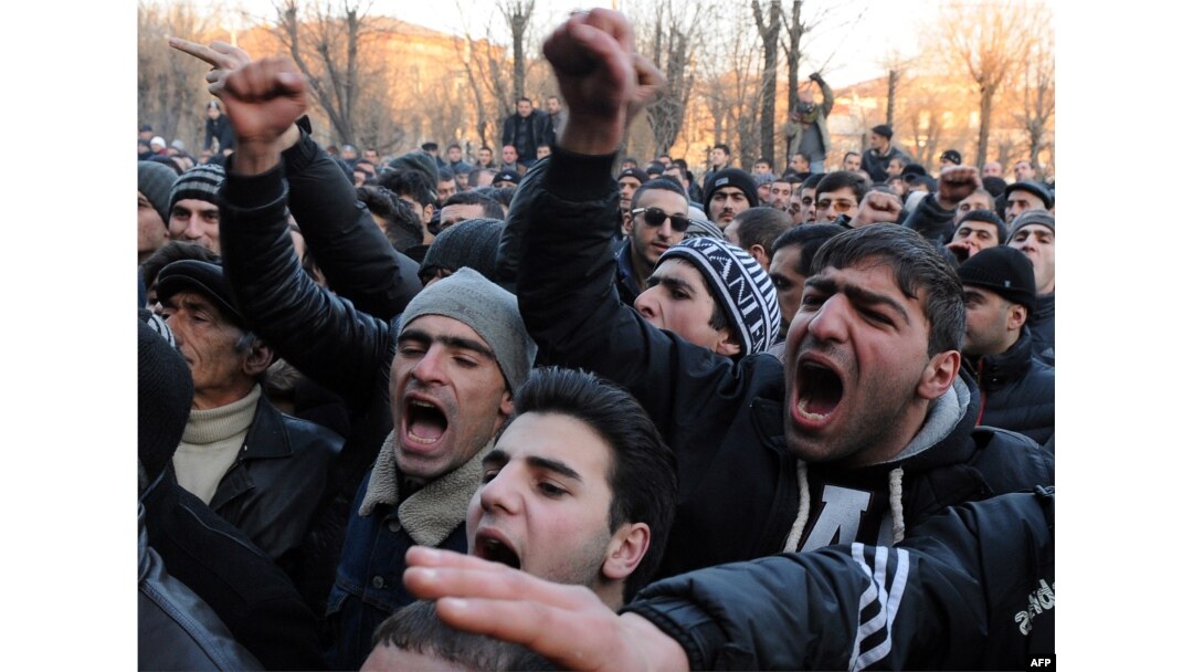 Armenians protest in front of the prosecutor's office in Gyumri on January 15 against the announcement that Valery Permyakov would not be tried by a local court.