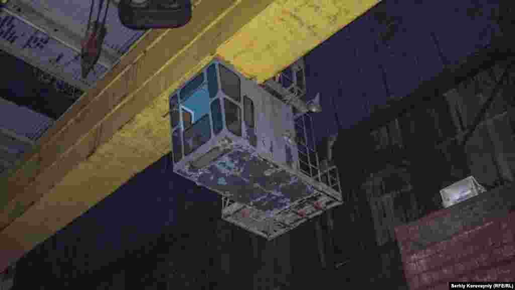A crane in turbine hall of Unit 4. With Chernobyl's concrete sarcophagus crumbling, the international community came up with a plan to build a new confinement structure.