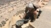 Yemen - A tribal fighter loyal to Yemen's Saudi-backed government inspects landmines, allegedly planted by Houthi rebels, after they seized control of areas in Marib province, Yemen, 04 October 2015