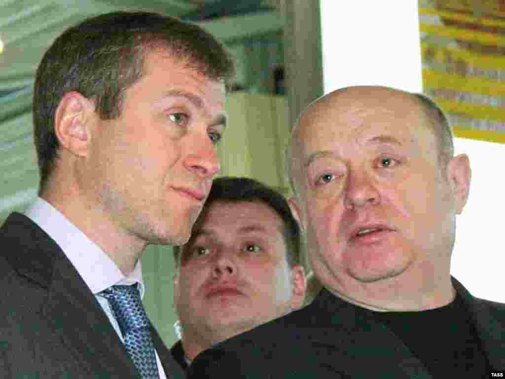 Caption: ITAR-TASS 17: ANADYR, CHUKOTKA, RUSSIA. APRIL 3. Russian Prime Minister Mikhail Fradkov  and Governor of Chukotka Roman Abramovich, left, visit the Chukotka Heritage Museum Centre in Anadyr