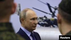 Presidenti rus, Vladimir Putin, gjatë takimit me pilotët ushtarakë. 27 mars 2024. 