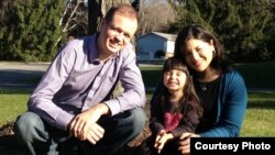 Jennifer Gaspar (right) poses with her daughter and husband Ivan Pavlov in 2012.